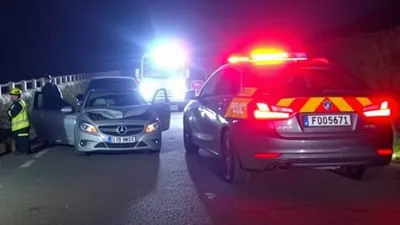 Mjesto saobraćajne nesreće kod Ljubuškog noću sa policijskim vozilom